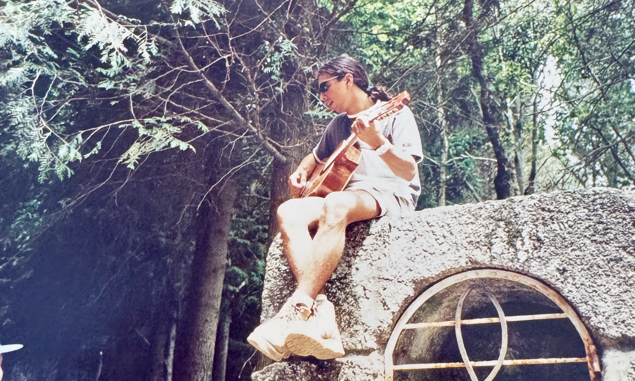 Guitar on stone wall